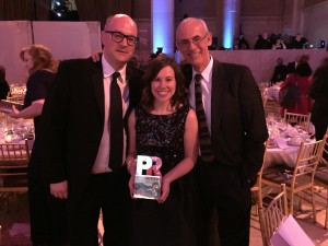 Steve Barrett, editor-in-chief at PRWeeK, Heather Bartman and Neil Mortine, president and CEO at Fahlgren Mortine at the PR Week Award ceremony. 