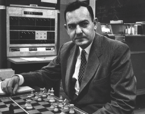 Herbert Simon, an early AI researcher, plays chess