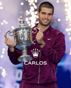 Carlos Alcaraz with the US Open Trophy featuring his Rolex watch